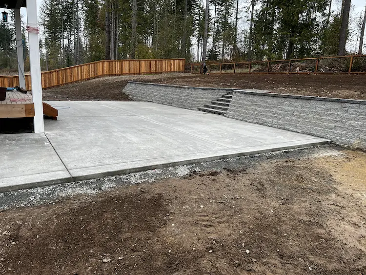 Concrete patio poured and installed by Variant Construction.
